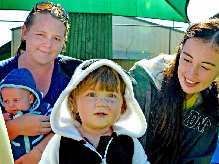 MUMS AND BUBS: PAMPA mum Tina Rose holds son Vince while Kirsty Connell watches daughter Gemma (15 months) play.